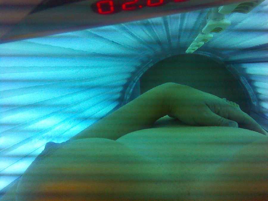 Nude in Tanning Bed