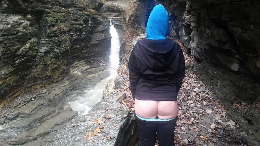 Flashing Her Butt by the Falls