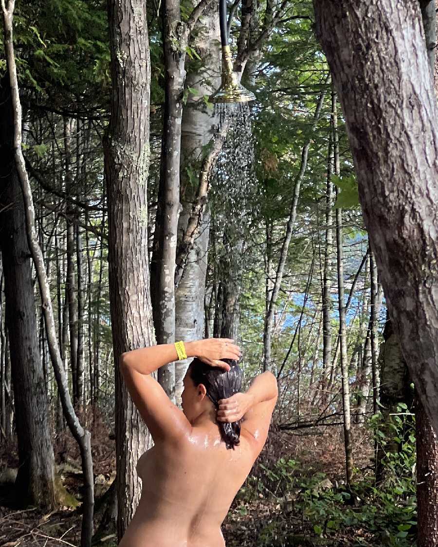 Taking an Outdoor Shower by the Lake