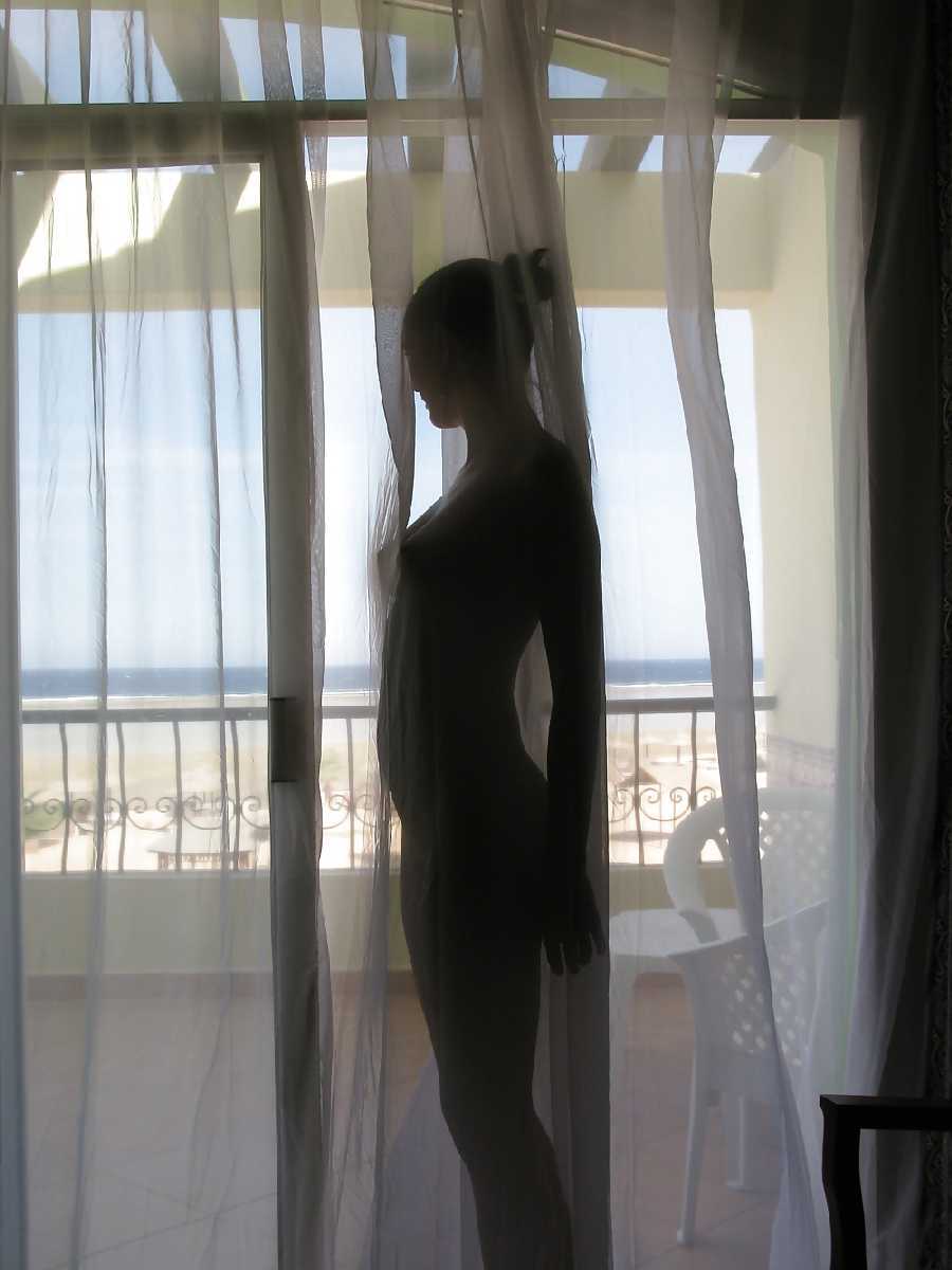 Naked by the see through Curtains!
