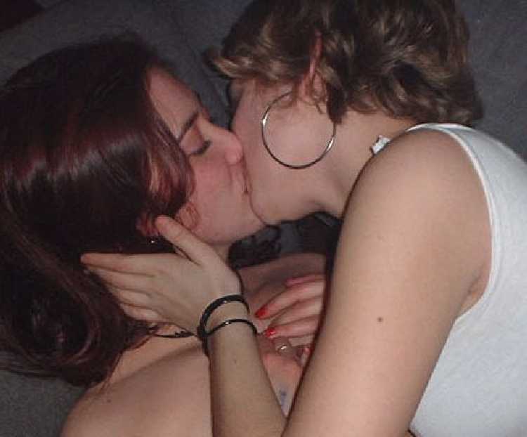 Woman Kissing Girl