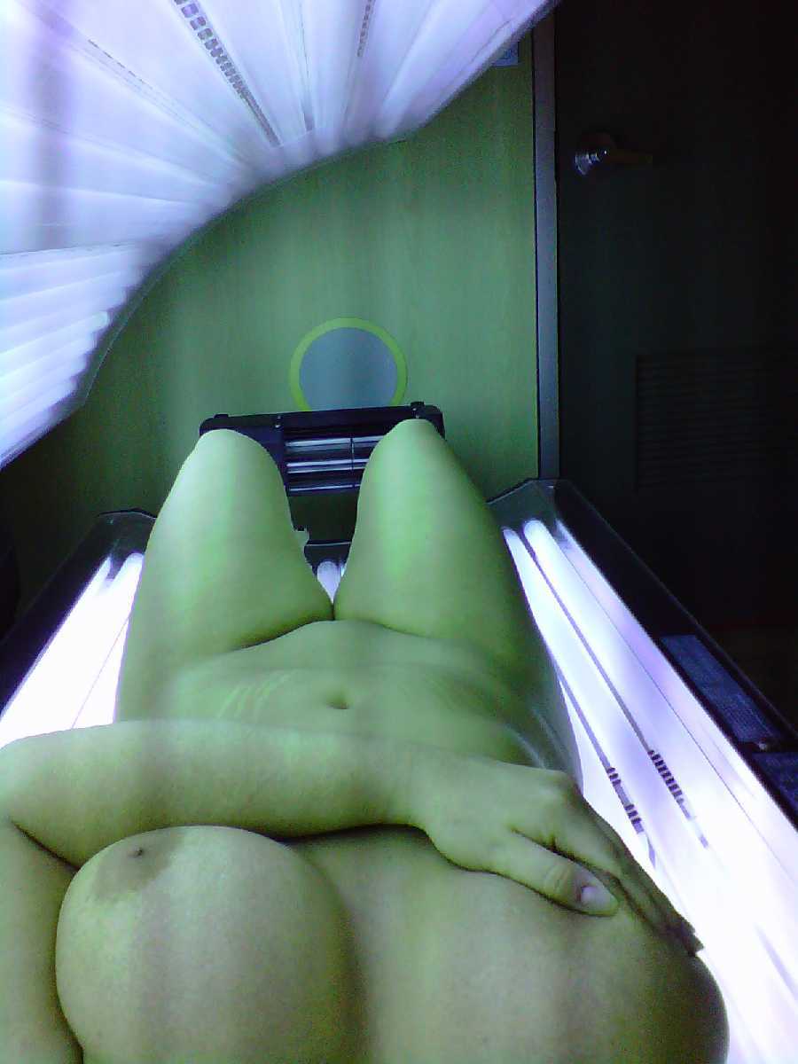 Tanning bed voyeur photo