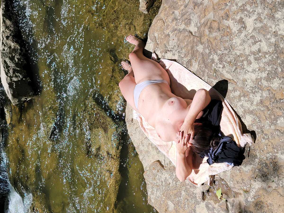Laying out Topless by the River