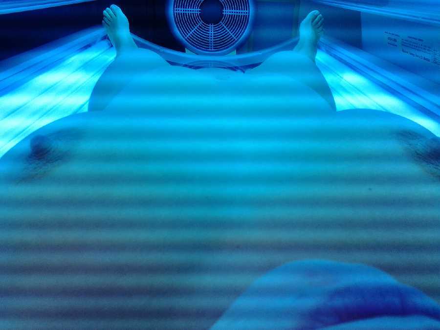 Hot Mom in Tanning Booth